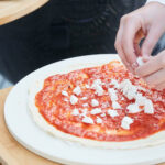 Pierre a pizza en argile refracatire couv